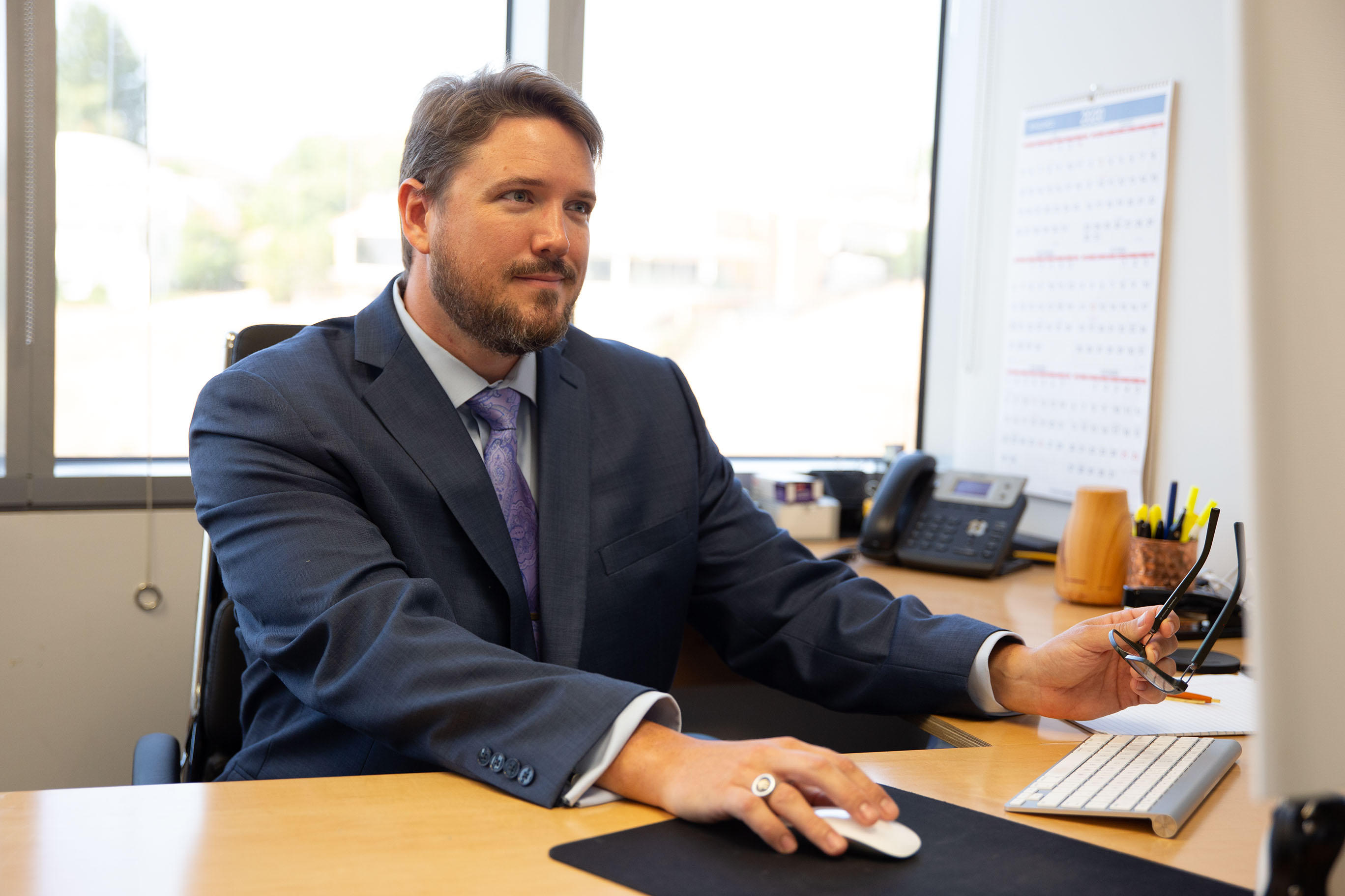 Workers' Compensation Attorney Joseph Richards Working At His Desk