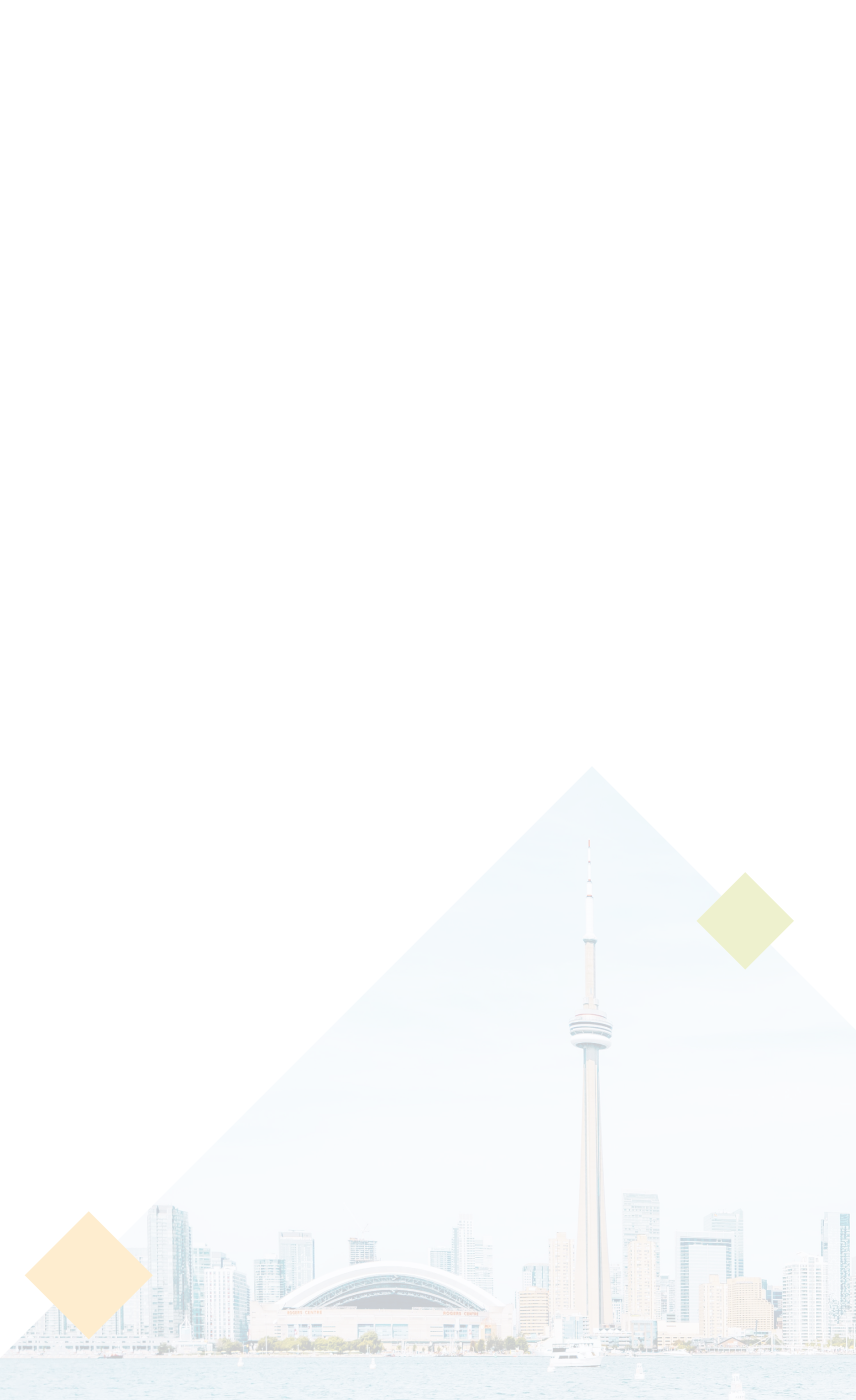 The Toronto skyline including Lake Ontario on a sunny day.
