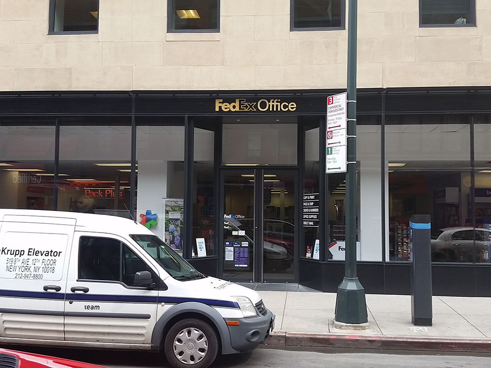 Exterior photo of FedEx Office location at 303 W 56th St\t Print quickly and easily in the self-serv FedEx Office Print & Ship Center New York (212)245-2324