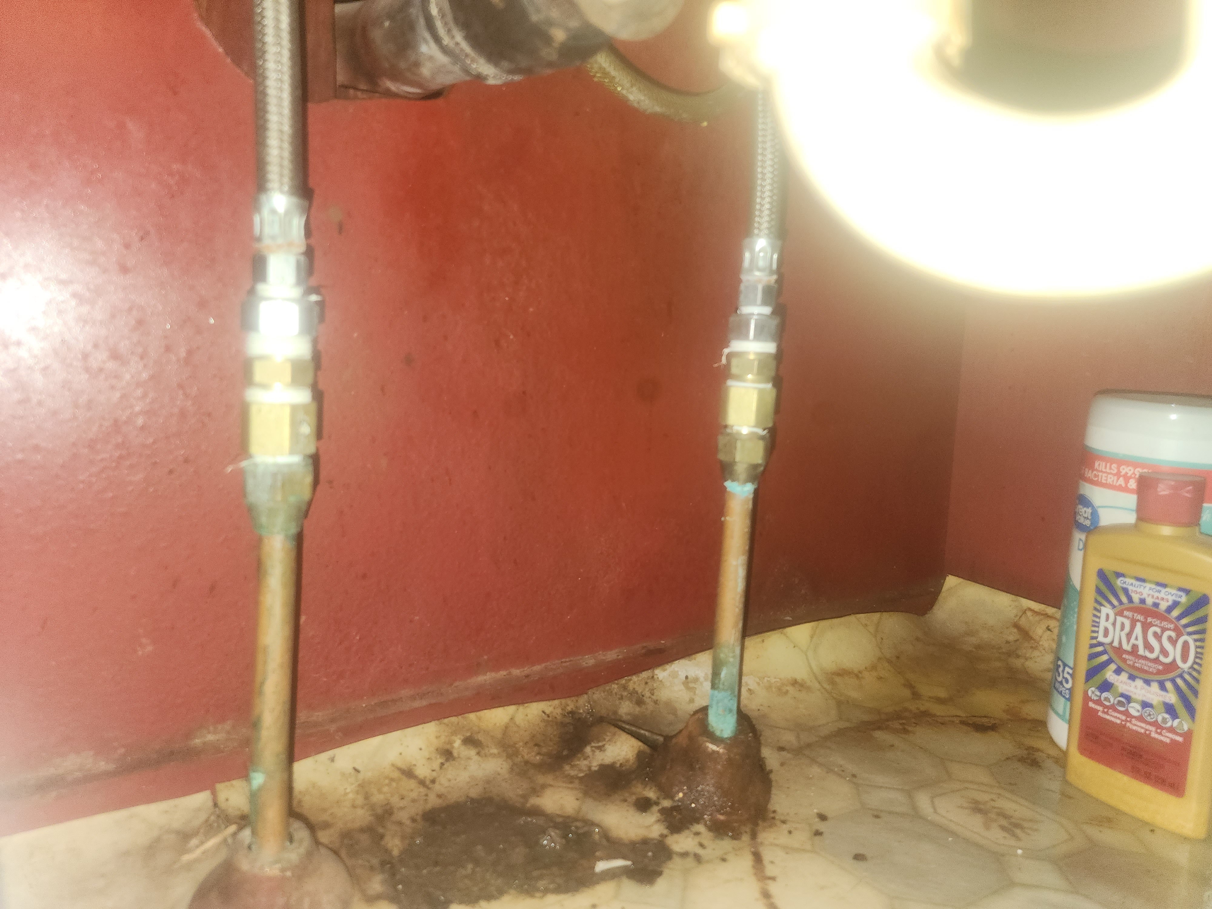 Professional-grade copper pipe soldering and fittings. 