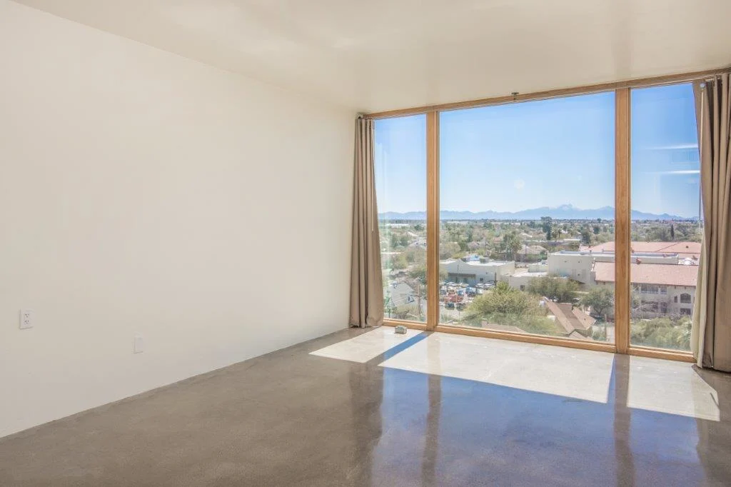 Apartment Living Room + Floor to Ceiling Windows