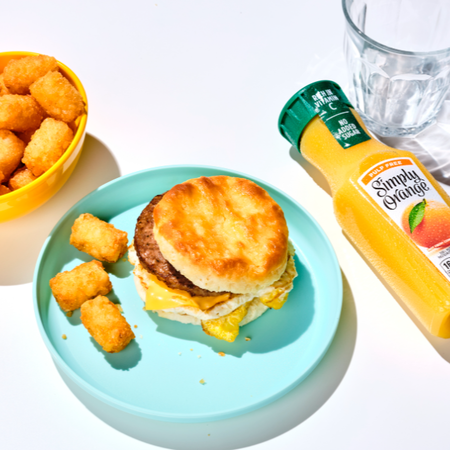 Start off your day right with our Sausage, Egg and Cheese Biscuit combo! It includes crispy tots, rich and flavorful coffee, Simply Orange® OJ or a small soft drink.