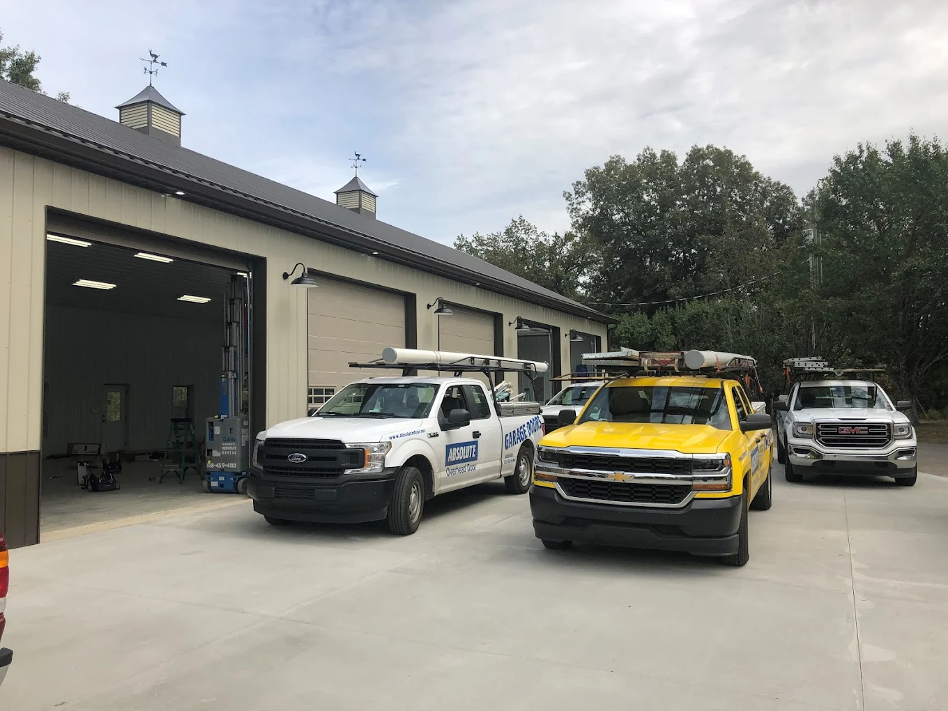 Absolute Overhead Door Service trucks