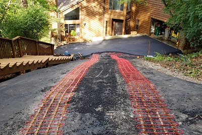 Big City Asphalt Laying Asphalt for a Residential Home