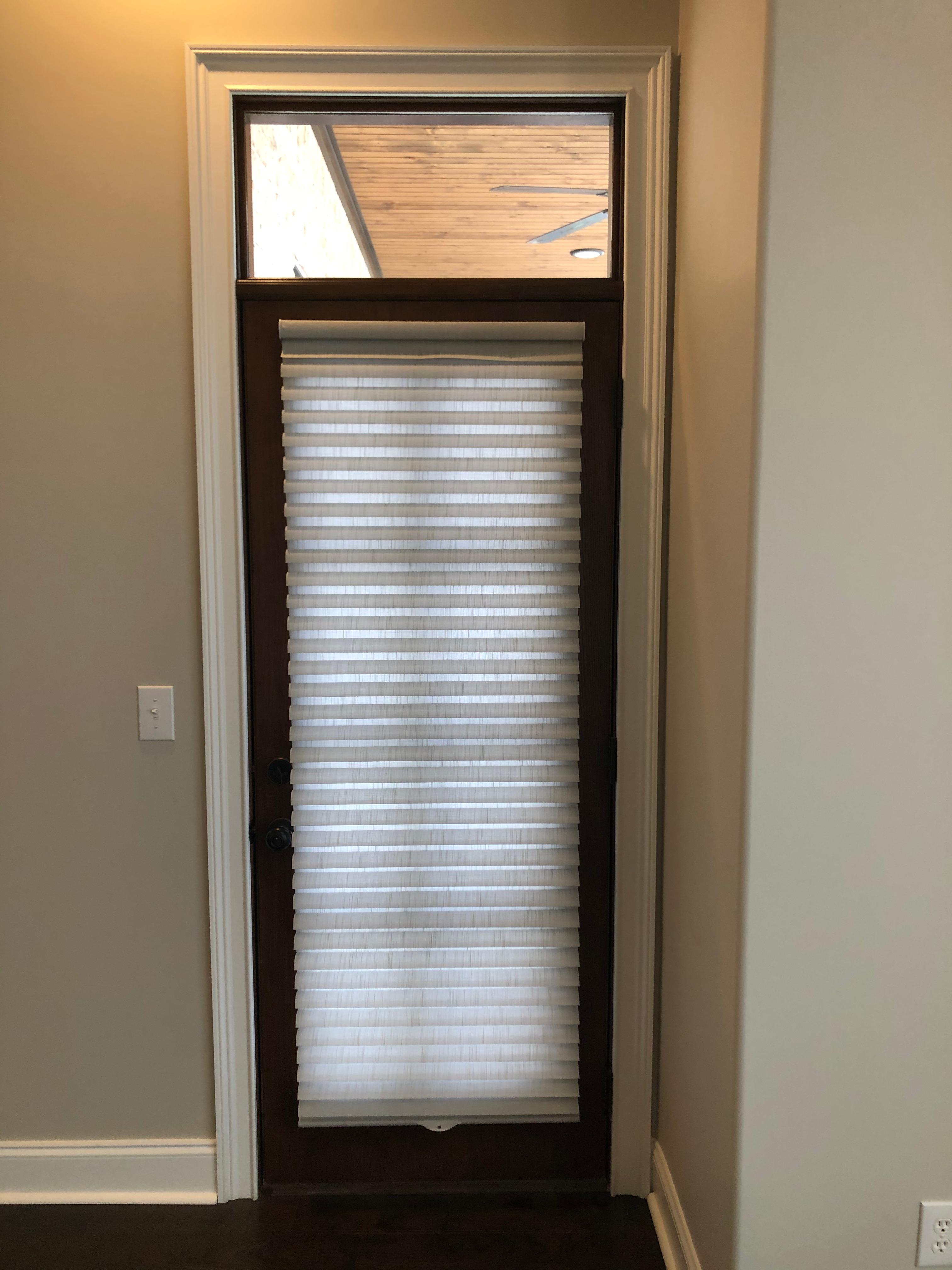 Dimension Cellular Shade on the door for privacy. . Tuscumbia, AL