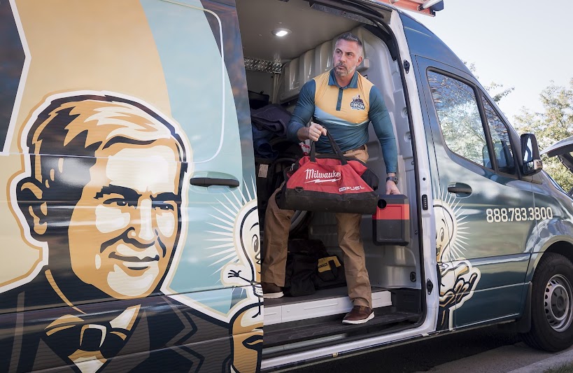 Thomas Edison Electric technician arriving at a service call with tools, representing residential and commercial electrical services across Pennsylvania