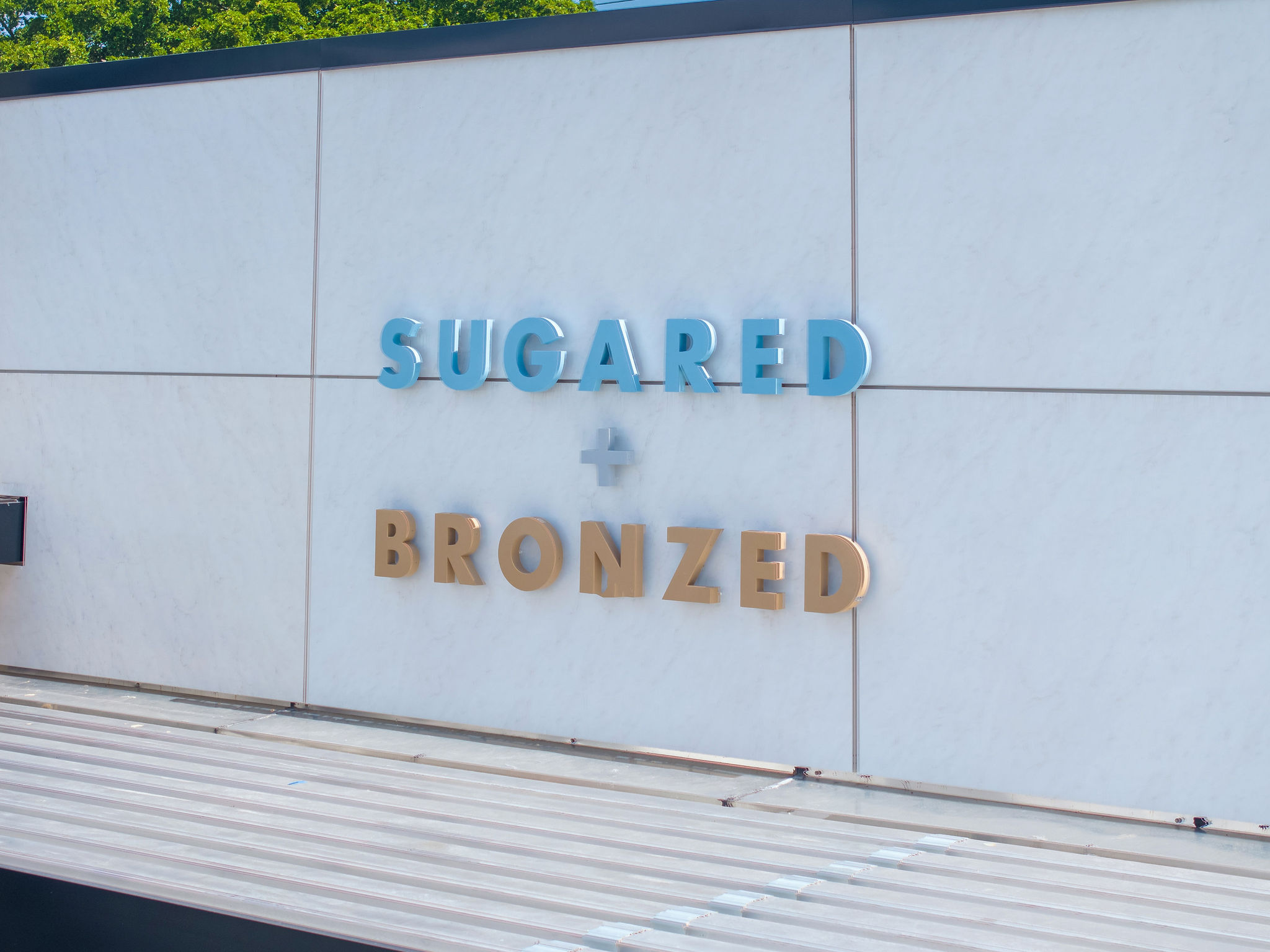 SUGARED + BRONZED Aventura Storefront