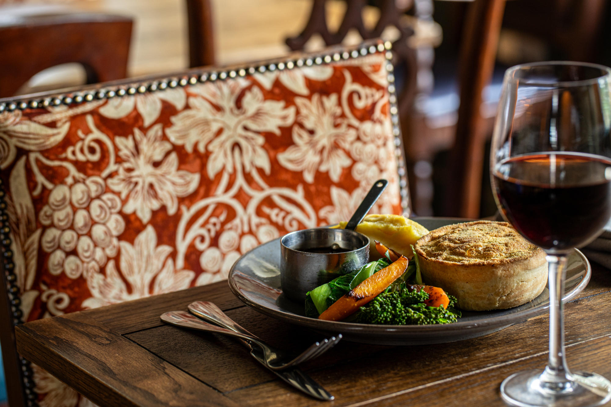 Handmade chicken & ham hock pie served with mash and buttered vegetables. Anglesey Arms Chichester 01243 699644