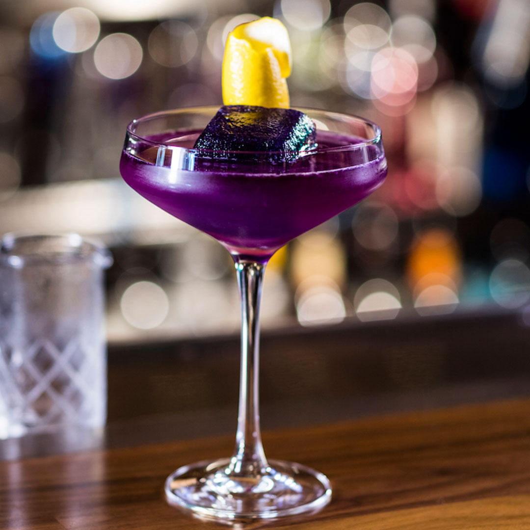 Our signature Hope Diamond Cocktail, featuring Grey Goose vodka, butterfly tea and a purple diamond ice cube