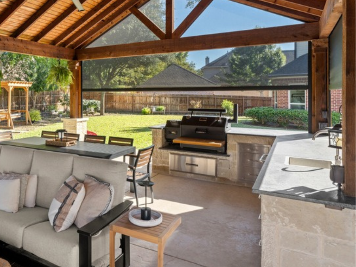Elevista exterior shades on a Mobile patio, softening the afternoon sun while keeping the outdoor view clear.