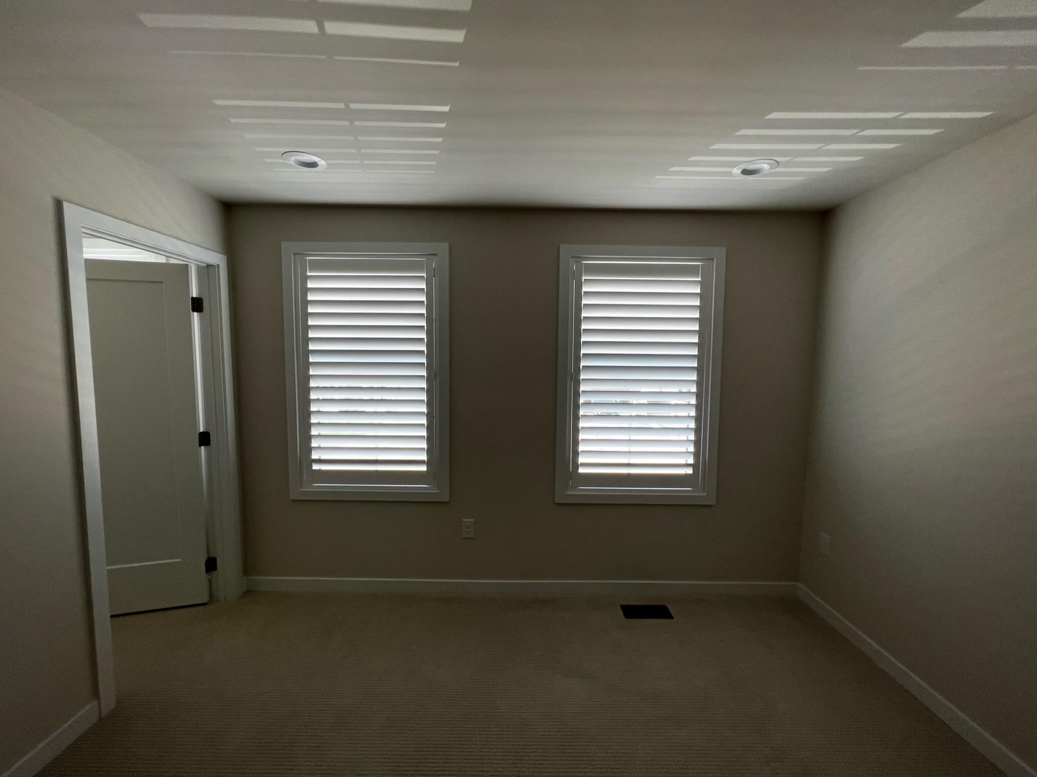 Norman Woodlore Shutters in Pure White for your King of Prussia, PA spare bedroom.