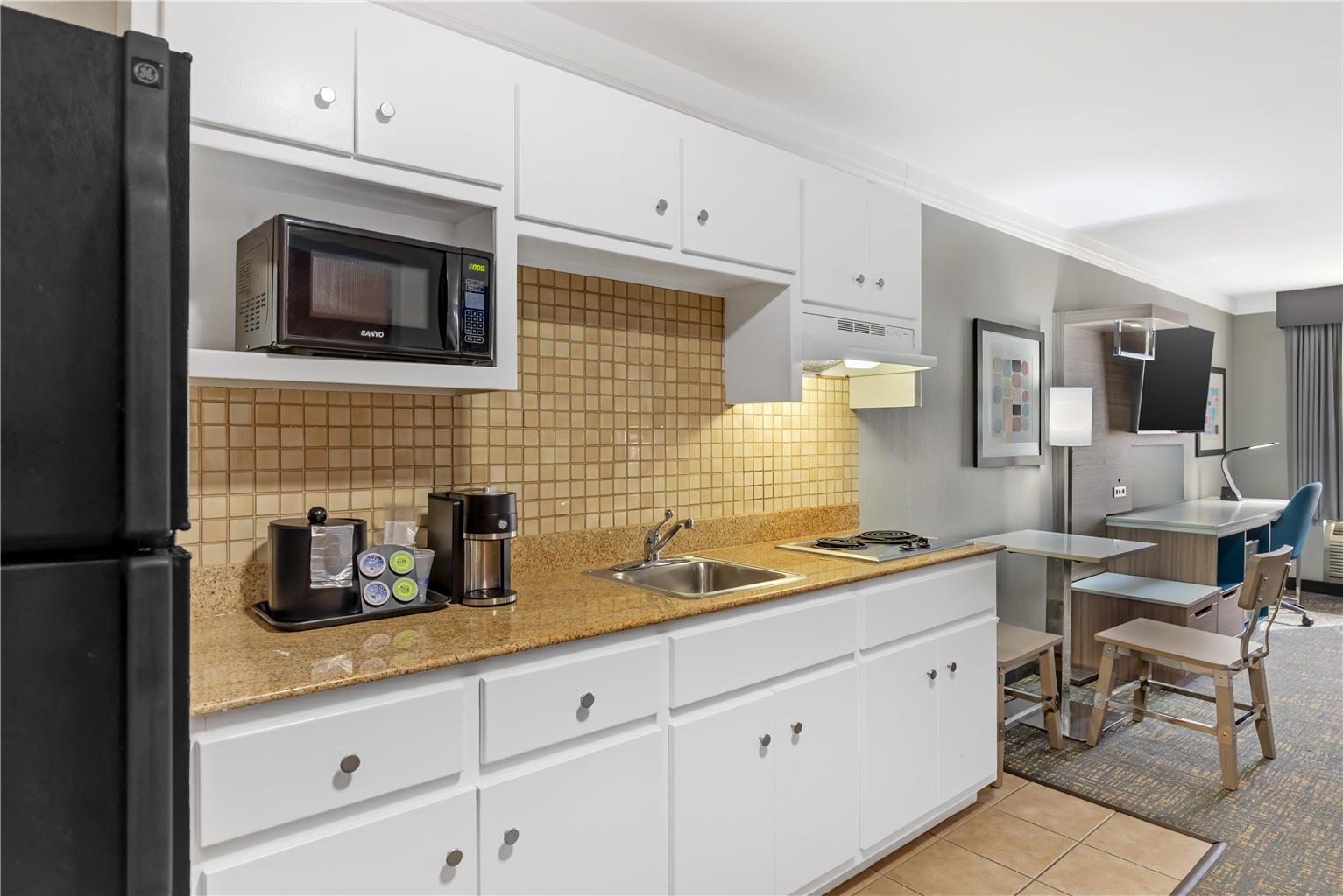 1 King Bed w/ Sofabed + Kitchen