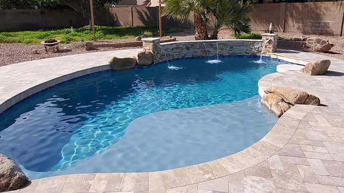 ✨ Newly Constructed Luxury Pool in Phoenix ✨

This stunning custom pool in Phoenix features a premium mini pebble finish for a smooth, durable surface. A spacious Baja step provides the perfect spot for lounging, while the elegant travertine coping and pool decking create a seamless, high-end look. Designed for modern outdoor living, this resort-style pool blends luxury with functionality, making it an ideal backyard retreat.