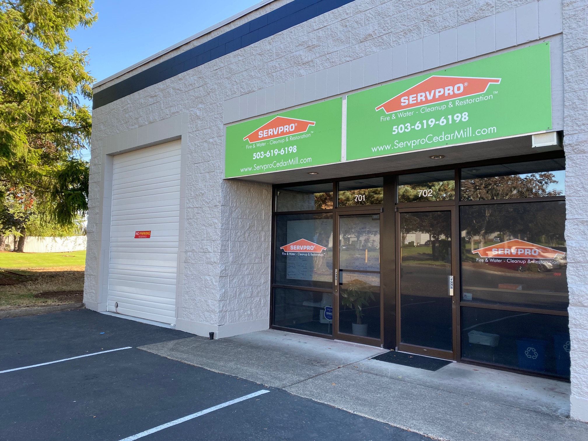 A closeup of SERVPRO of Cedar Mill/Oak Hills main office and signage. Drop in or call us today for any of your water or fire mitigation needs.