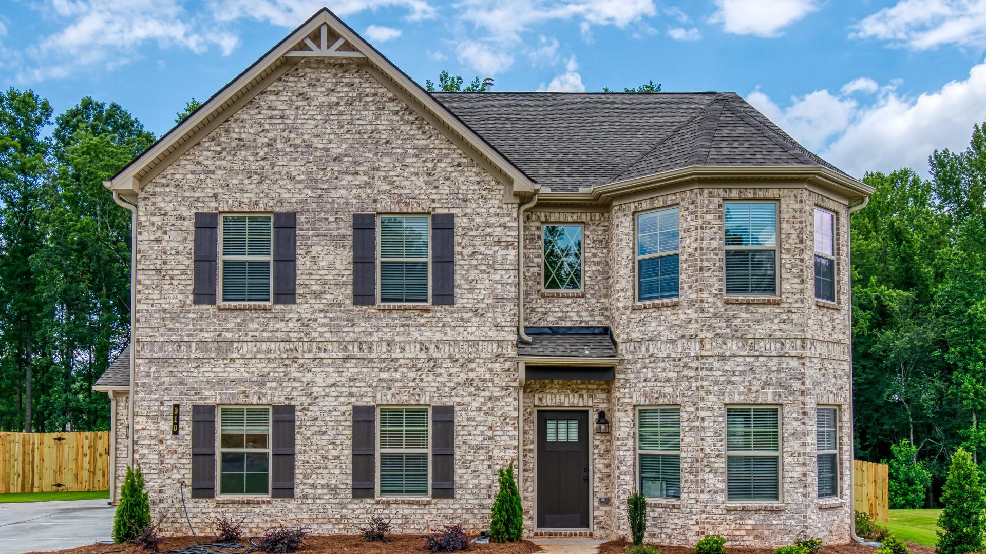 All brick 2 story home in the DRB Homes Traditions at Crystal Lake community