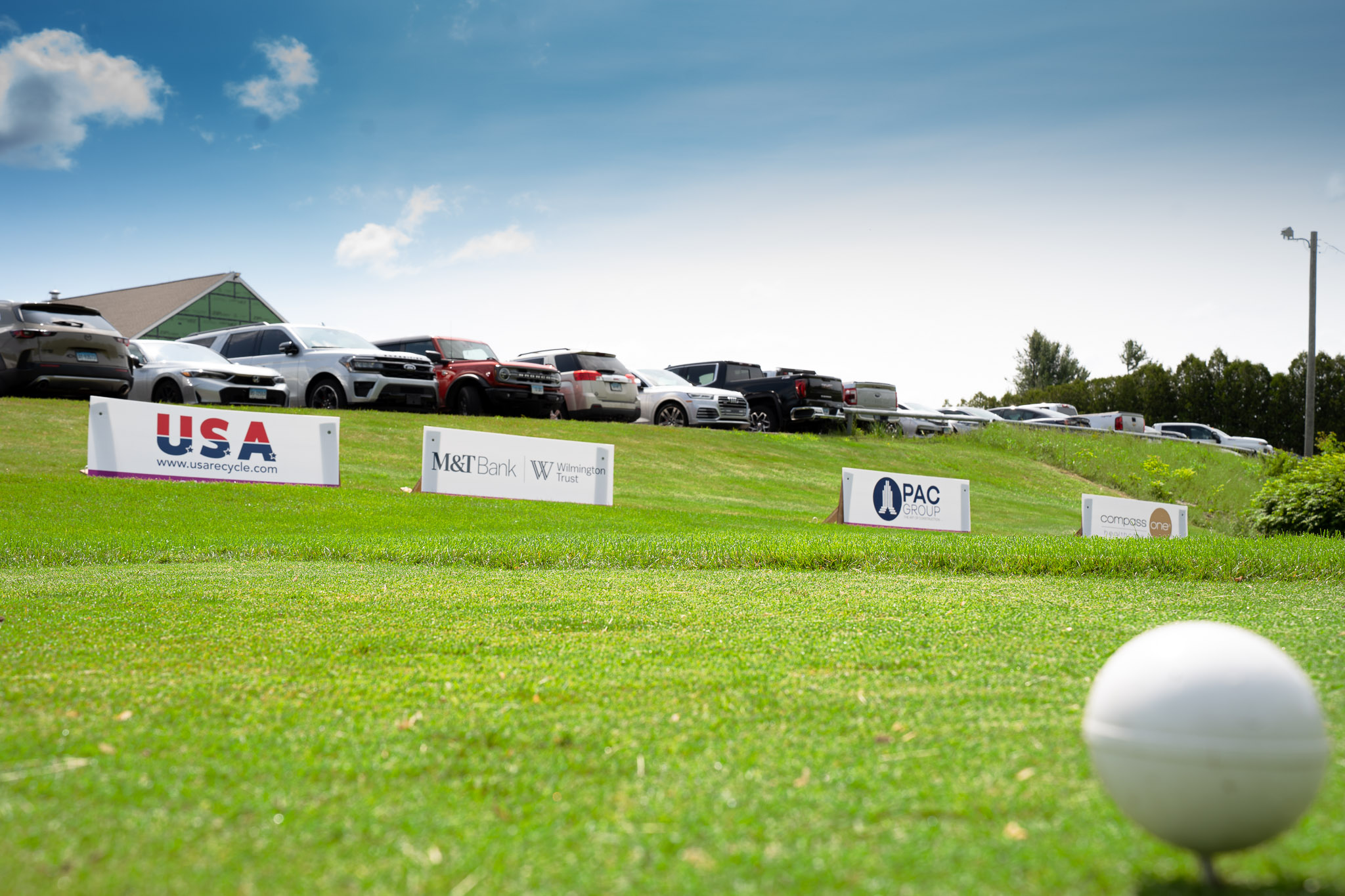 Custom sponsor tee signs produced by Sign Pro to recognize event sponsors during the Charlotte Hungerford Hospital Golf Classic.