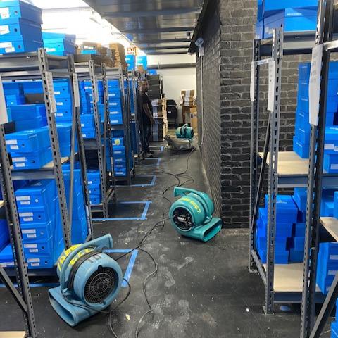 water damage restoration equipment used to dry a warehouse