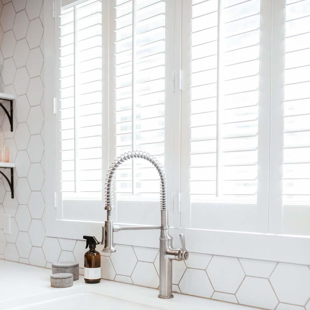For a classic yet modern look, shutters have stood the test of time! The clean lines and functionality lend well to utilitarian designs that feature open shelving, geometric tile, and modern hardware.