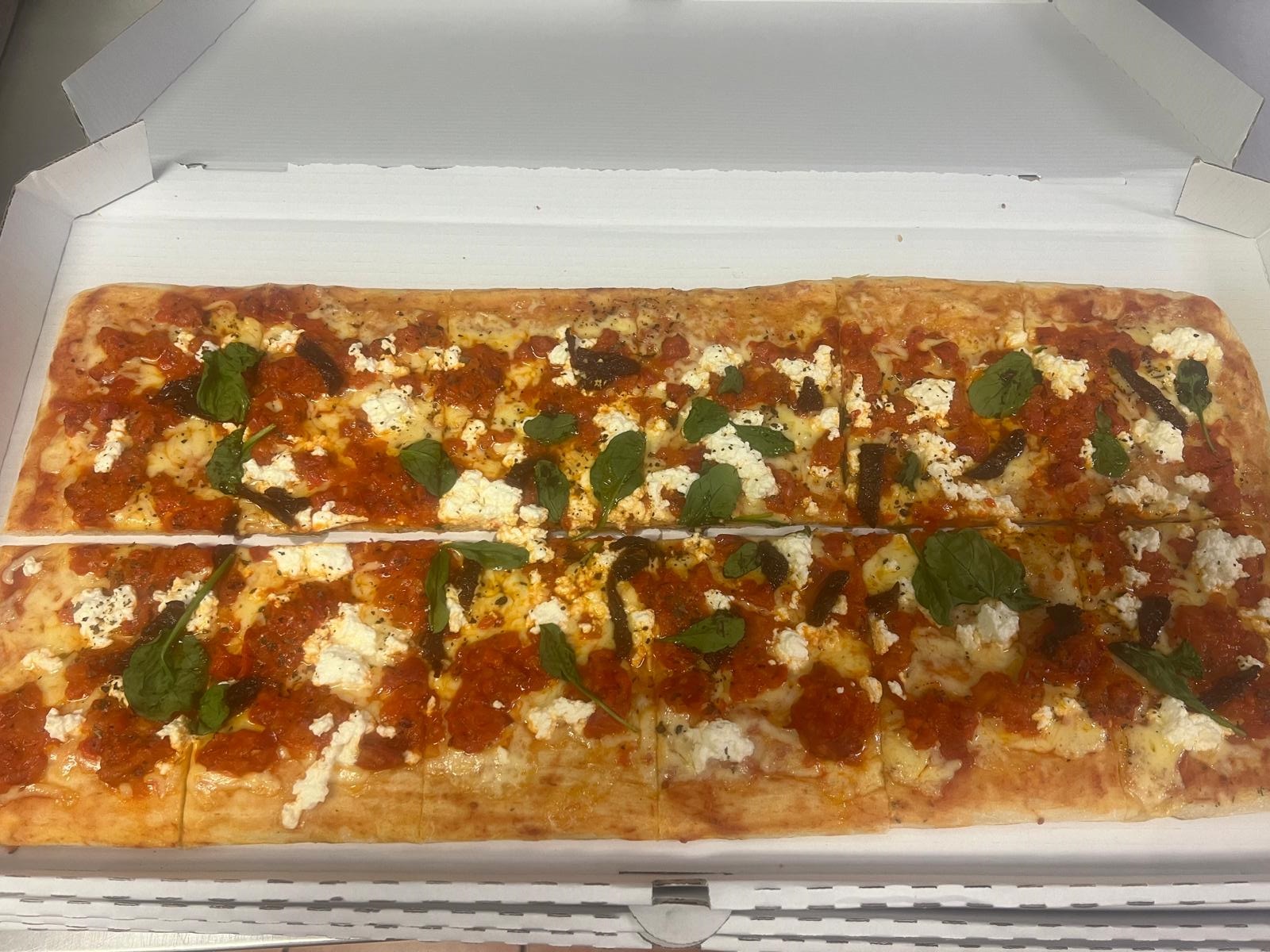 Images Rocket Gourmet Pizza by the Slice