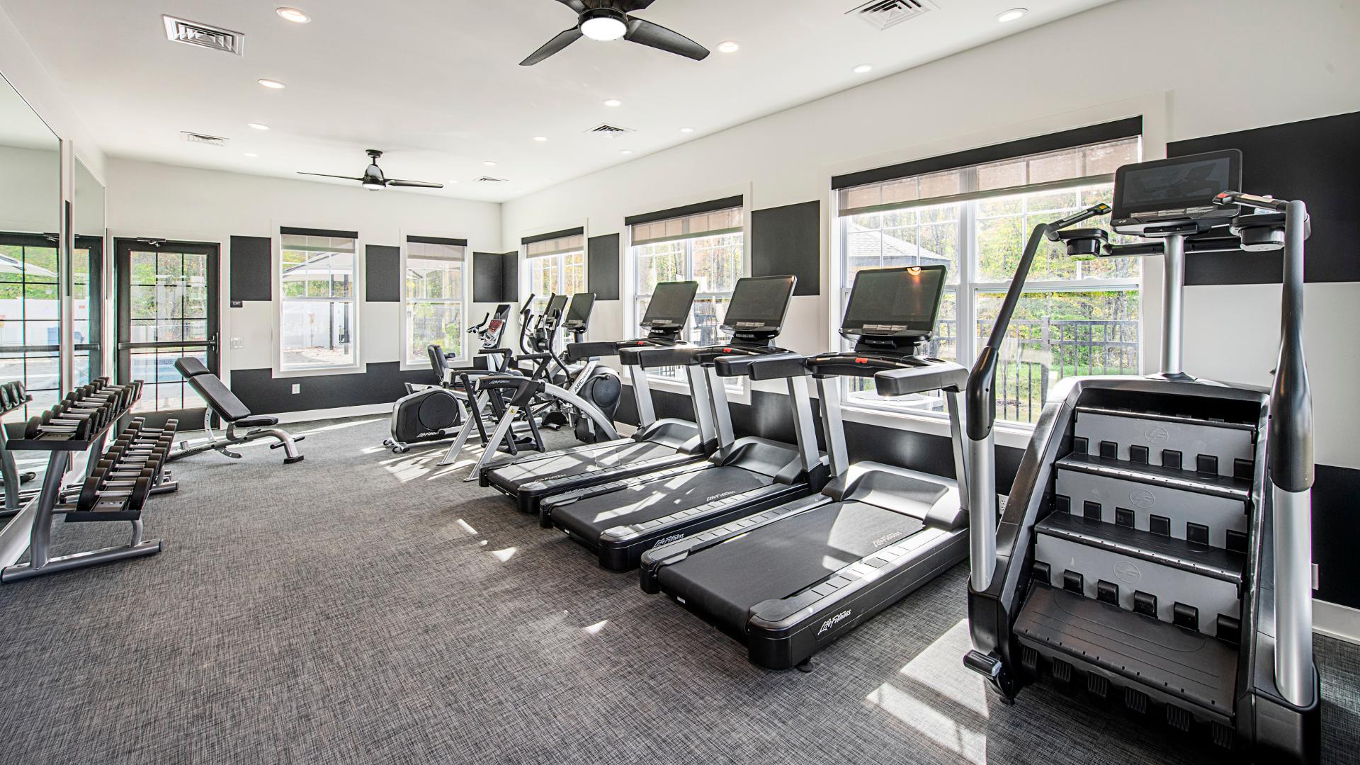 Stay active close to home in the clubhouse fitness center, featuring a variety of equipment designed to support your wellness routine