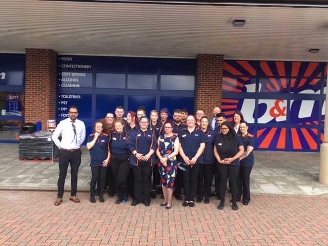 The store team at B&M's newest store in Huntingdon pose in front of their wonderful new Home Store & Garden Centre, located at Huntingdon Retail Park.