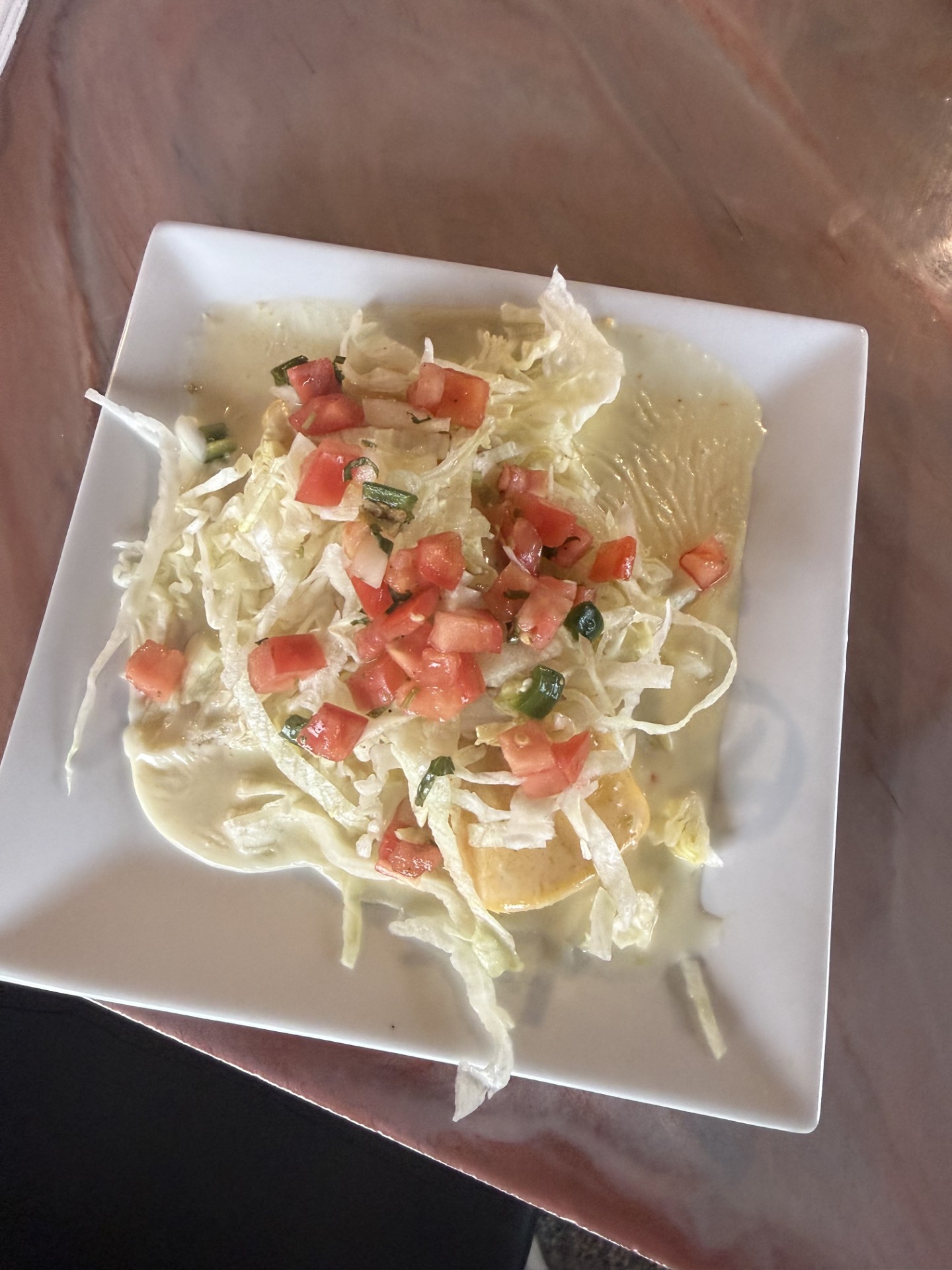 Chicken enchiladas served at Catramex Restaurant featuring seasoned chicken, authentic Mexican sauces, melted cheese, and fresh traditional flavors in Southern Maine.