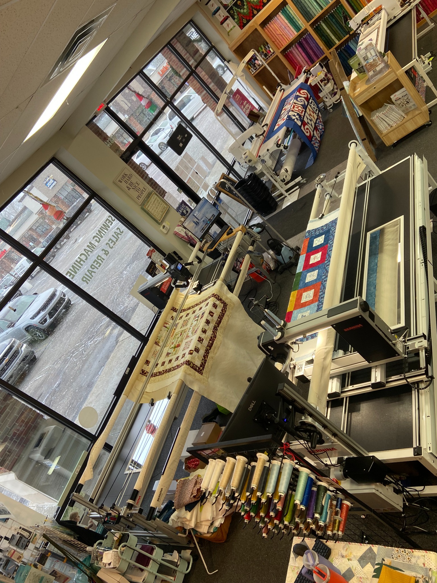 Decorative Stitch offers professional longarm quilting services using advanced BERNINA quilting systems. Browse colorful fabrics, custom quilting projects, and expert craftsmanship in a welcoming quilt shop.