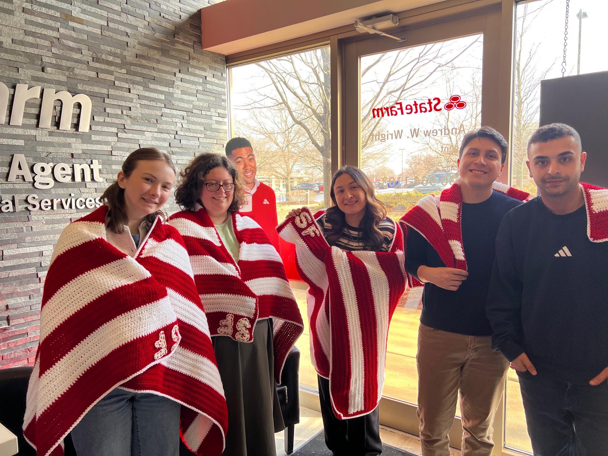 One of our team members’ dads hand-knitted blankets for the people in our office who sit by the windows.