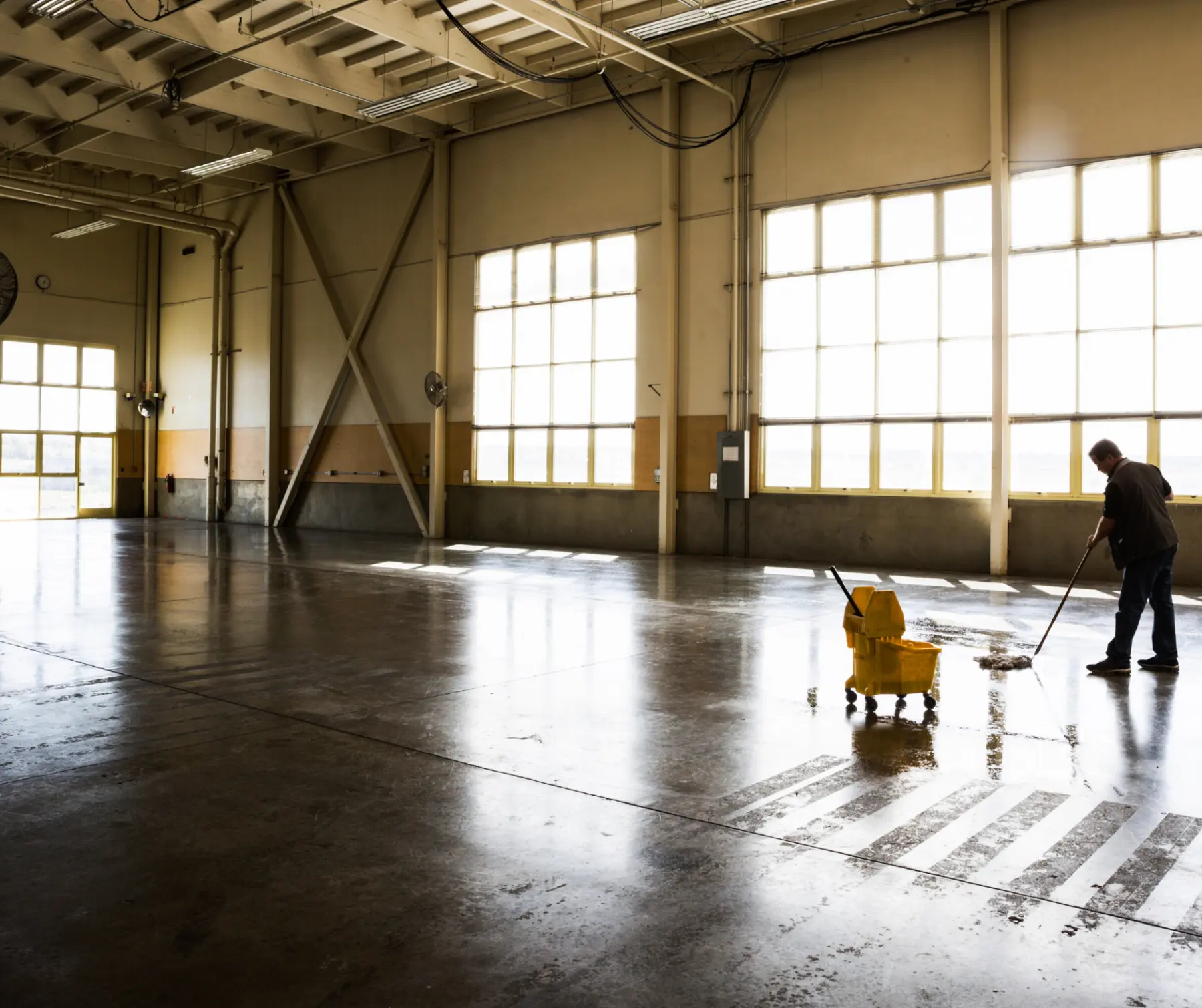 This expansive industrial facility was professionally cleaned by Dallas Janitorial Services, showcasing our ability to maintain large commercial spaces. The gleaming floors demonstrate our expertise in commercial floor care for high-traffic industrial environments.