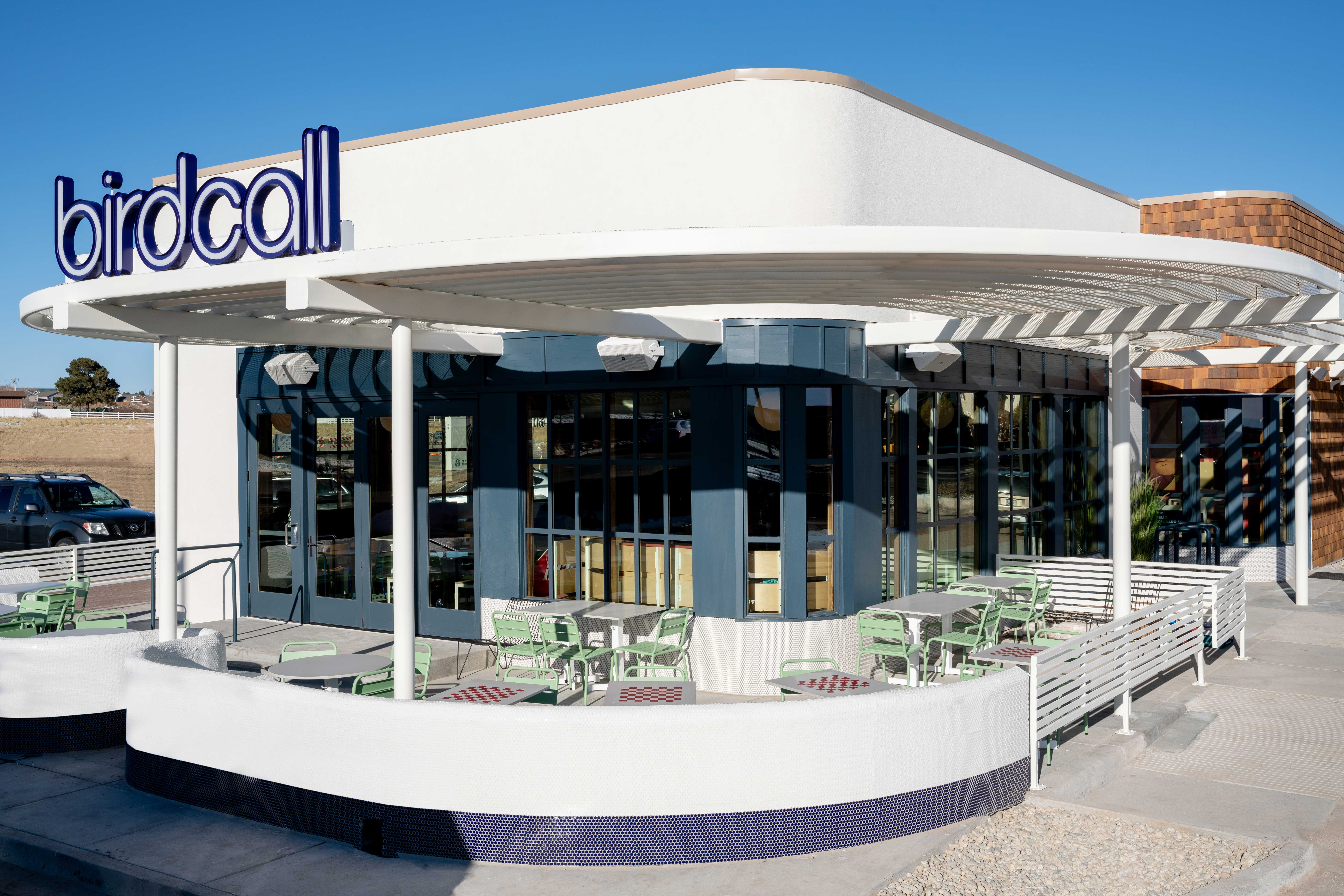 Exterior of Birdcall Colorado Springs showing off the dog-friendly patio.