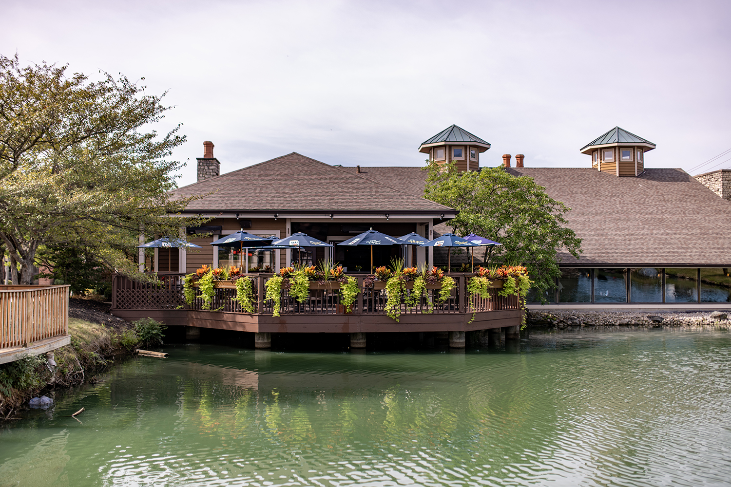 Outdoor seating on our spacious back deck overlooking the duck pond.