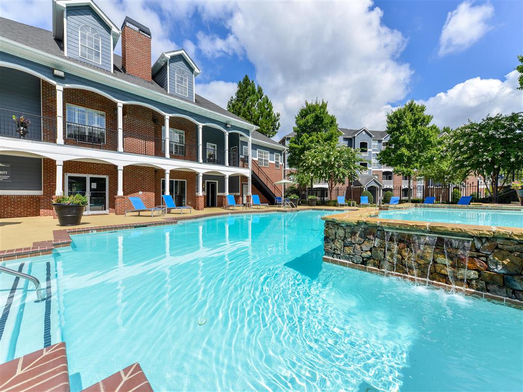Resort Style Pool with Soothing Waterfall Features and Sundeck with Poolside Wi-Fi Access at Sugarloaf Crossing Apartments