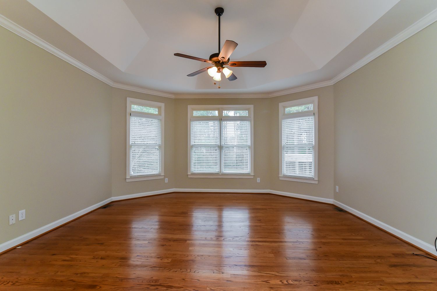 Gorgeous dining space with hardwood flooring at Invitation Homes Atlanta.