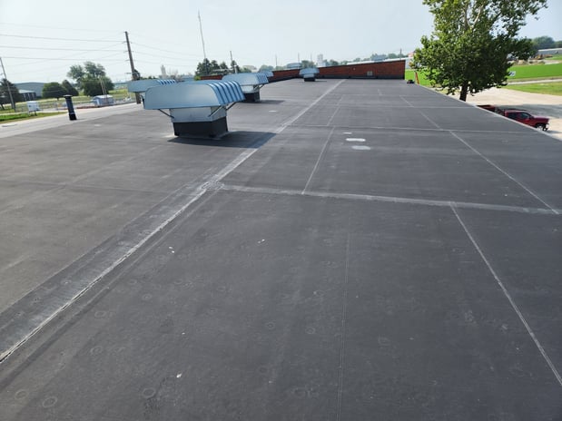 Images Moss Roofing & Insulation Inc
