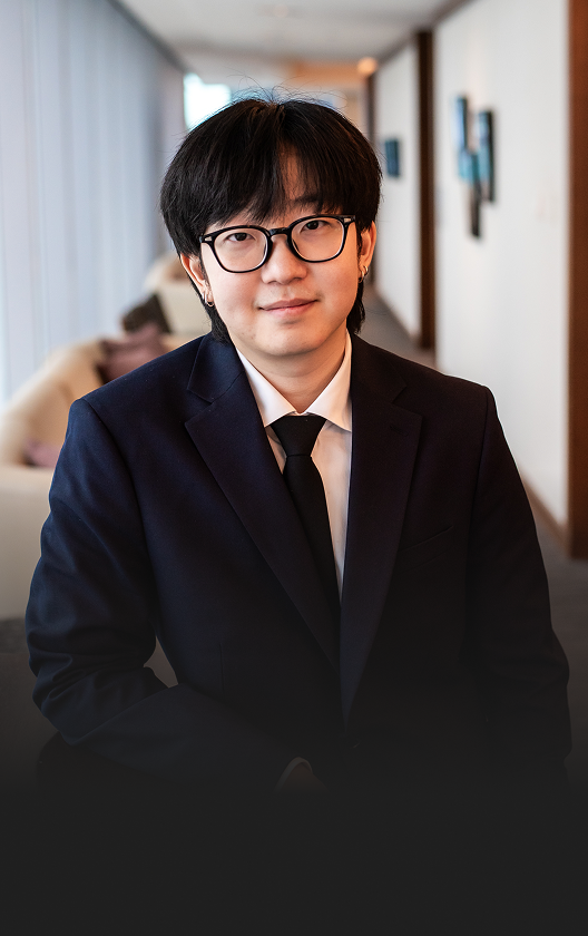 Headshot of Daniel Yu, Associate.