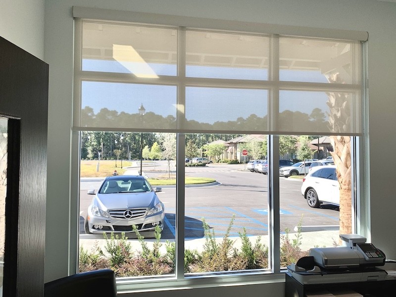Yes, we offer services to businesses too! Check out how our sheer solar shades create a modern look for this local Hilton Head Island business. Plus, these shades allow for the perfect amount of privacy, while letting in soft natural light.
