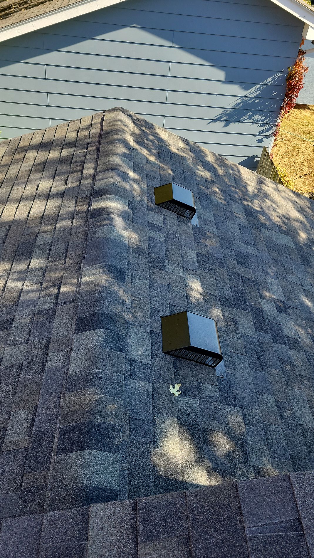 Re-Roof in Waukee with Malarkey Vista Class 4 Impact Resistant Architectural Shingles in color Storm Grey