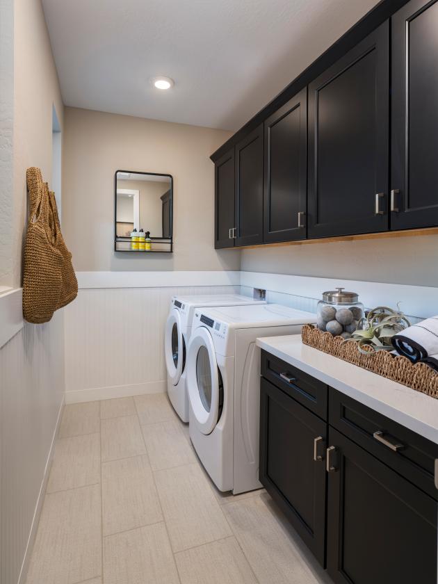 Laundry room with spacious cabinet storage