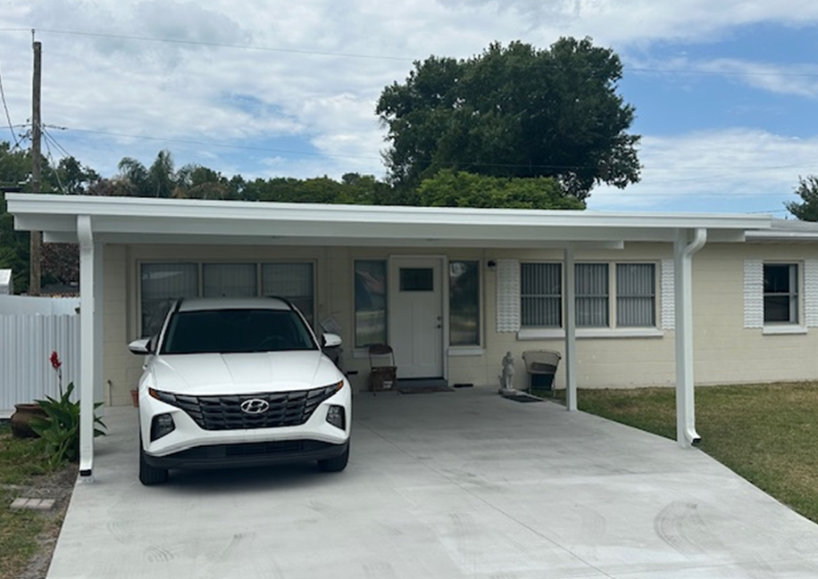 Protect your vehicles from the elements- sun, hail and more- by adding a carport to your home