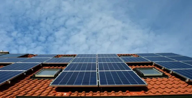 Solar energy system installed across a residential tile roof, maximizing renewable power production. The integrated design supports energy savings while maintaining roofing performance and home aesthetics.