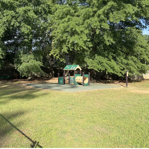 Safe, fenced playground area at Childcare Network where children enjoy active outdoor play