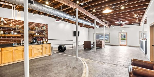 Customer lobby and waiting area inside Rob&rsquo;e Mans European Auto Repair in Homewood, Alabama featuring modern seating, upscale interiors, professional automotive branding, and a welcoming environment for European vehicle owners waiting on repair and maintenance services. The lobby reflects the company&rsquo;s commitment to luxury customer care, honest automotive service, and high-quality European auto repair for Mercedes-Benz, BMW, Audi, Porsche, Volkswagen, Jaguar, MINI, and Land Rover vehicles throughout Birmingham and Central Alabama.