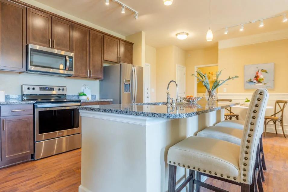 Spacious Kitchen With Pantry Cabinet at The Residences at Bluhawk Apartments, Overland Park, KS, 66085