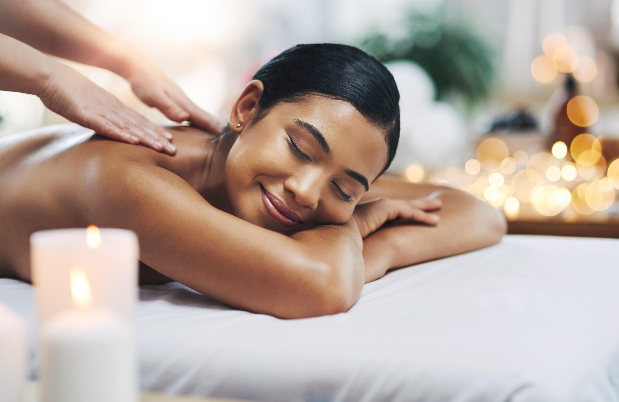 Women relaxing during massage therapy