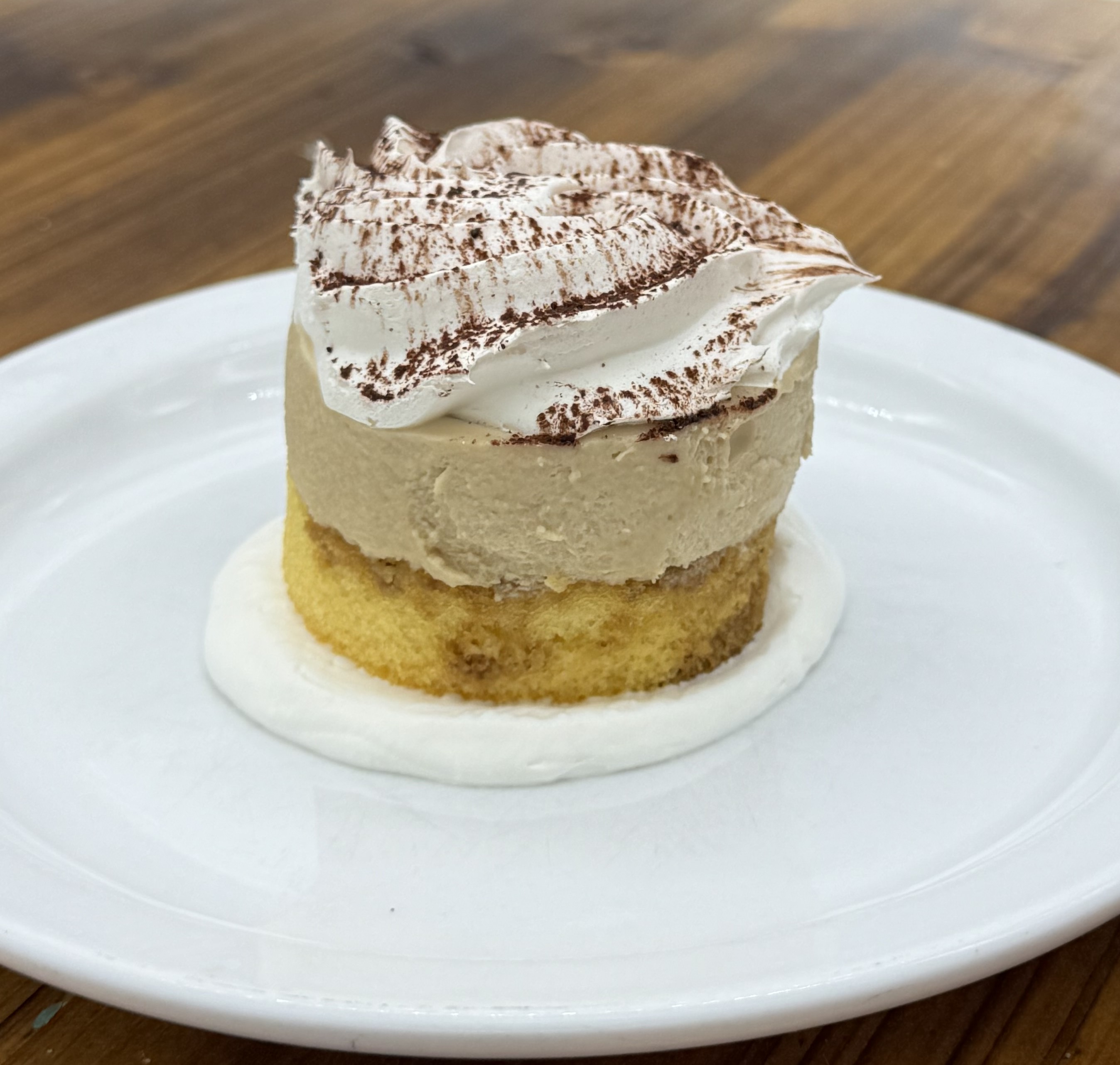 The perfect size tiramisu cupcake, ready to be enjoyed after any meal at Floridino's. Delicious to the last bite, and not overwhelmingly large.