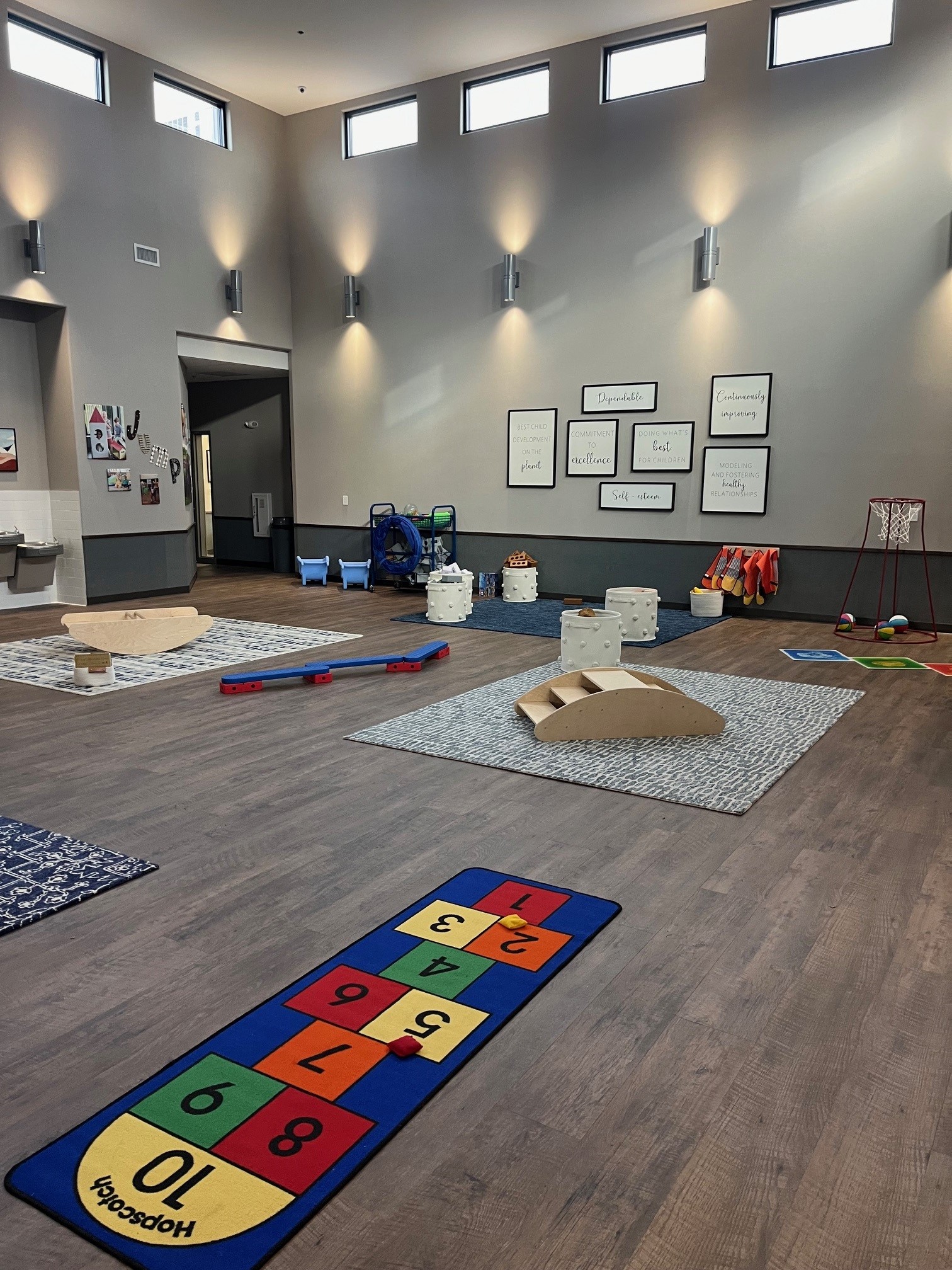 An indoor gym for young children at New Horizon Academy in Overland Park, KS.