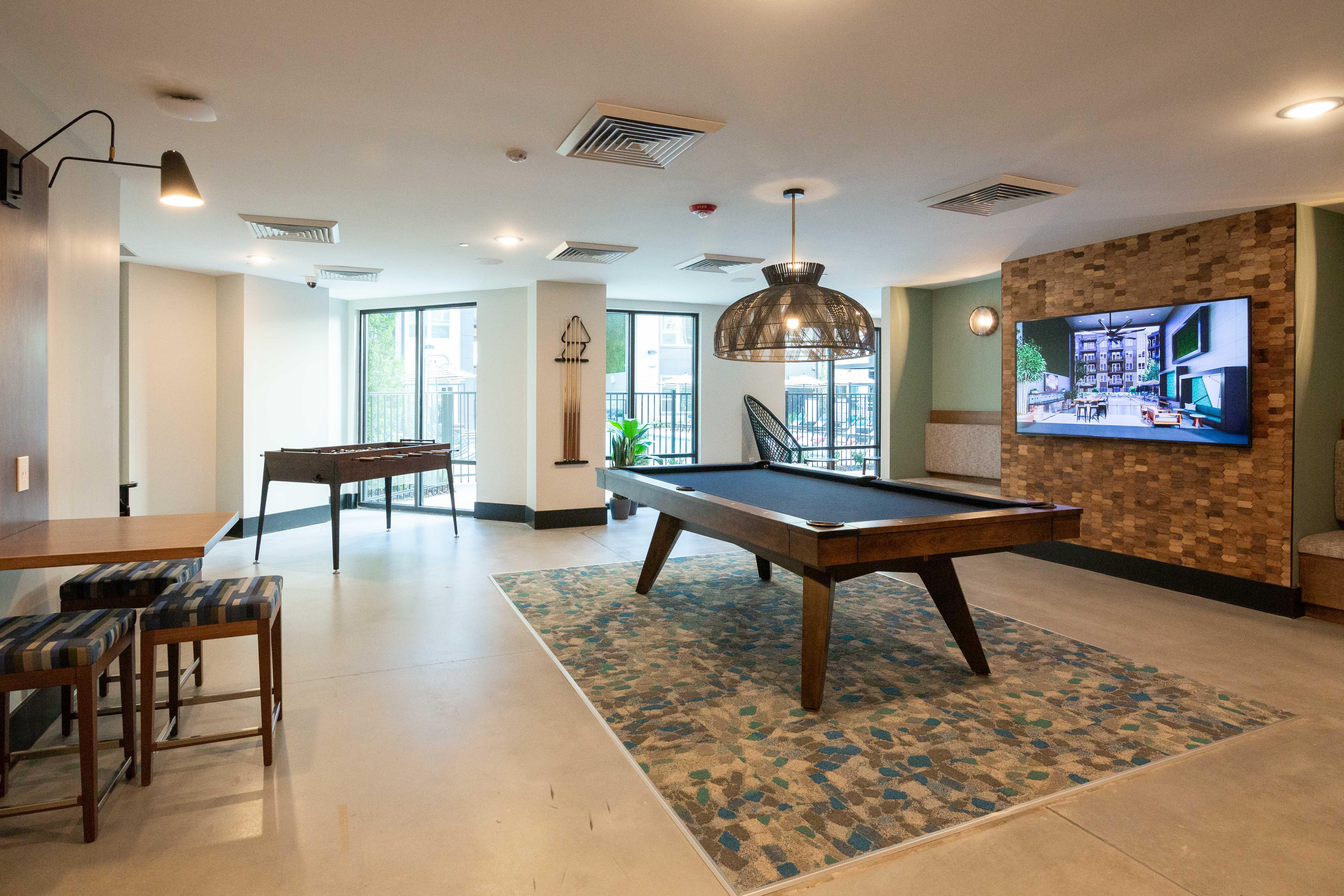 Programmed community room with billiards