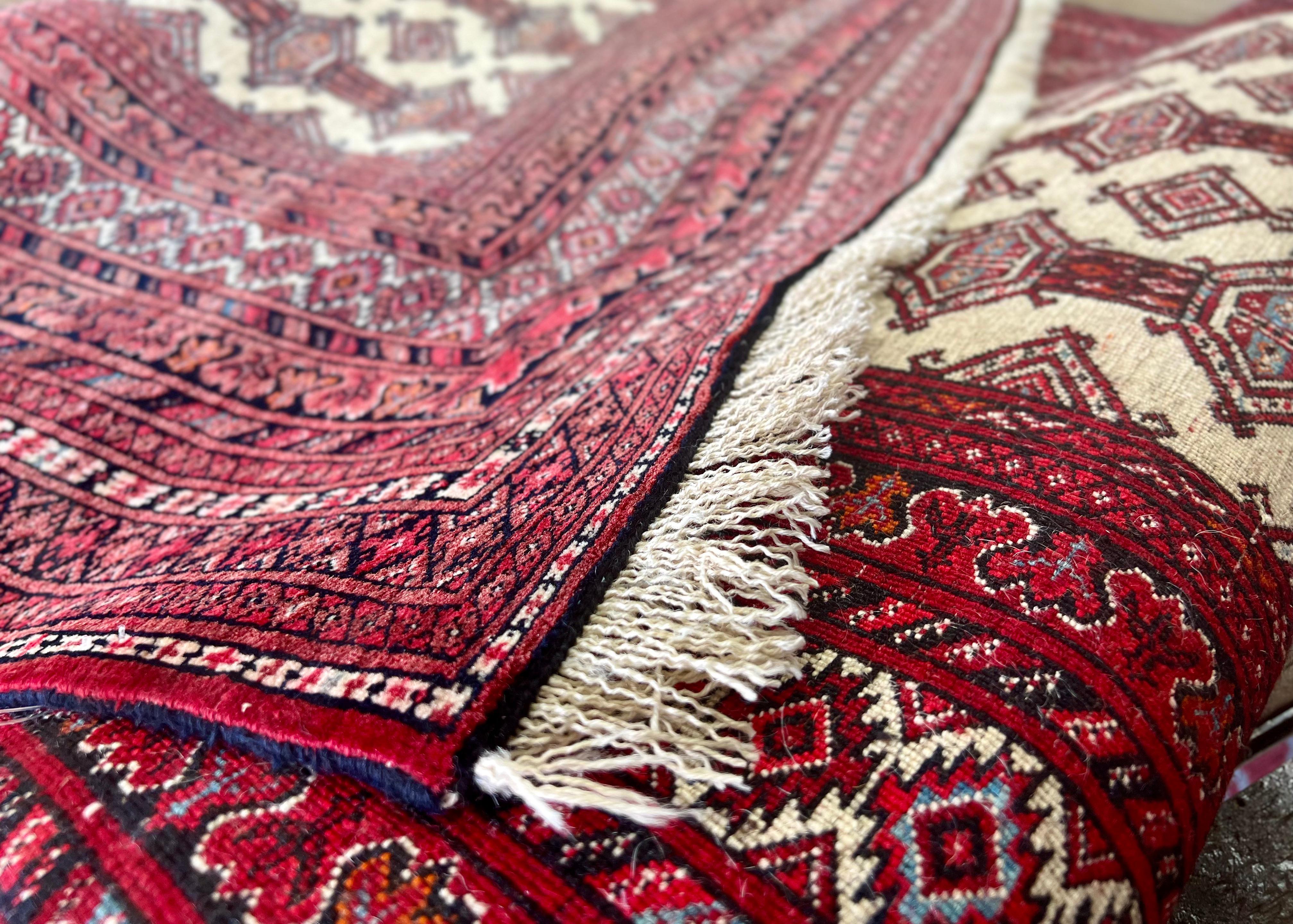 Securing fringe on an oriental rug.