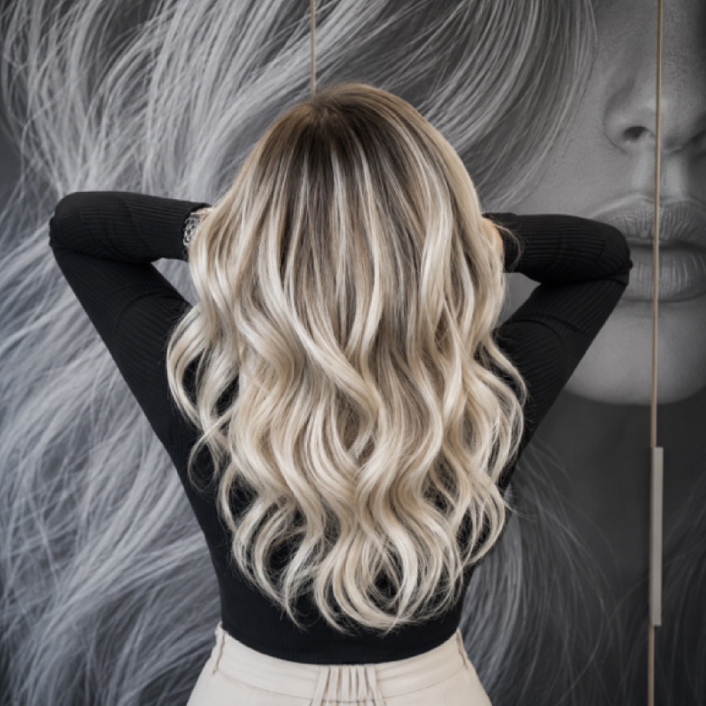 Custom platinum blonde hair color by the expert blonding specialists at Avissa Salon in Ann Arbor. P 