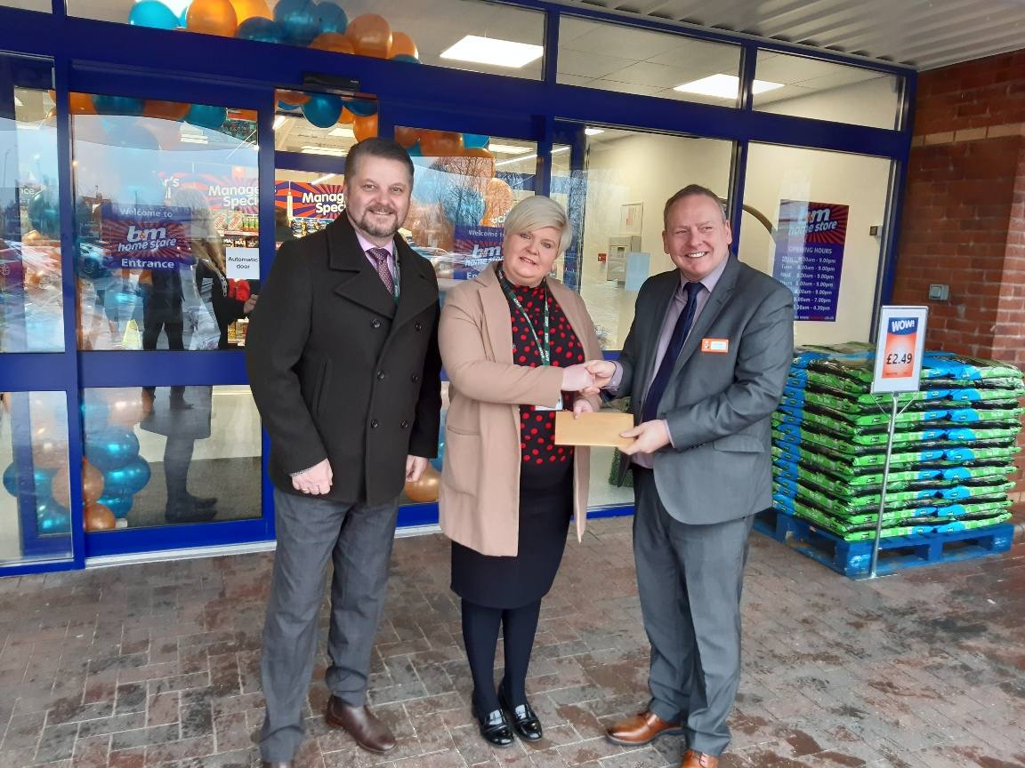 Store staff at B&M's new store in Warrington were delighted to welcome representatives from local charity, St. Rocco's Hospice, the store's chosen charity for opening day. The charity received £250 worth of B&M vouchers in appreciation of their dedication
